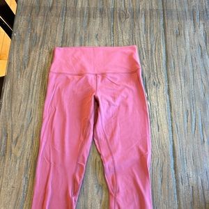 Lululemon Size 8 women's align leggings. Light maroon, dark pink